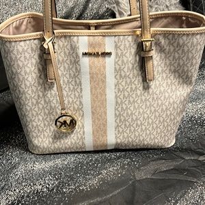 White striped Michael kors signature bag
